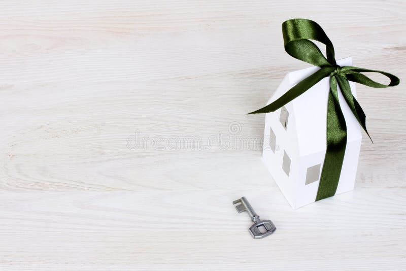 Model Of A House In Gift Box With Red Ribbon Stock Photo, Picture and  Royalty Free Image. Image 53249624.