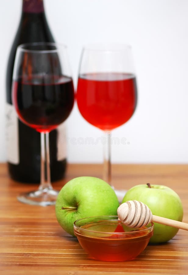 Jewish new year symbolics- apples, honey and vine. Jewish new year symbolics- apples, honey and vine