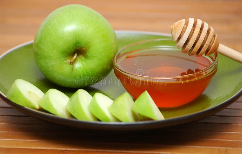 Jewish new year symbolics- apples, honey and vine. Jewish new year symbolics- apples, honey and vine