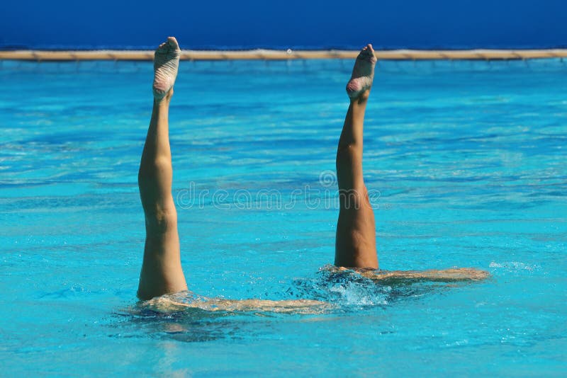 Synchronized swimming duet during competition