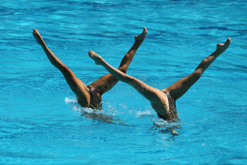 Synchronized swimming duet during competition