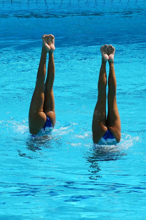 Synchronized swimming duet during competition royalty free stock photos