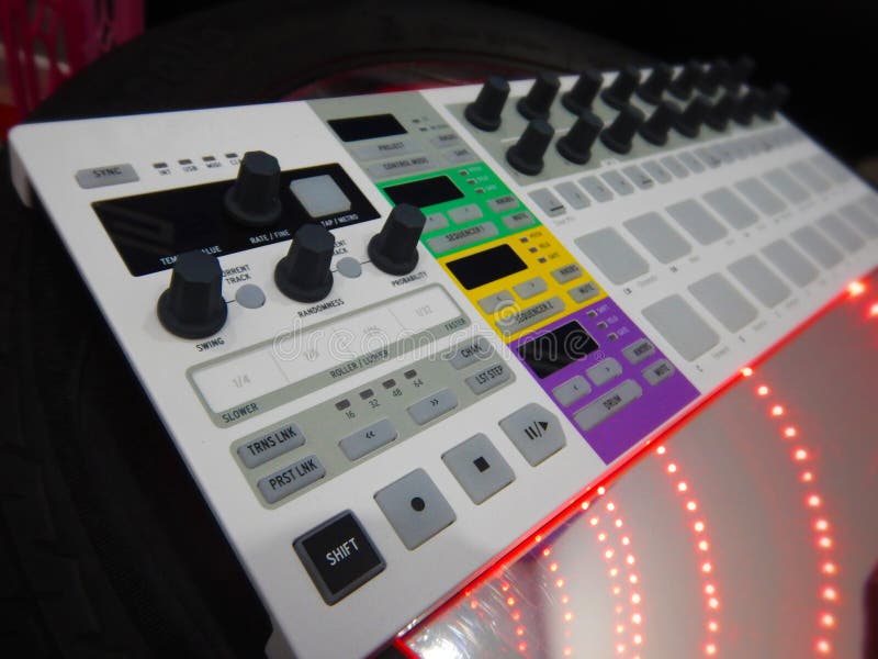 Synthesizer on black tire stock photography