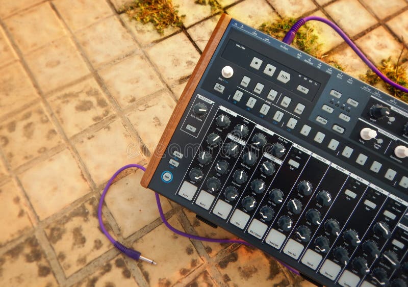 Synthesizer outdoor with purple cable royalty free stock photography