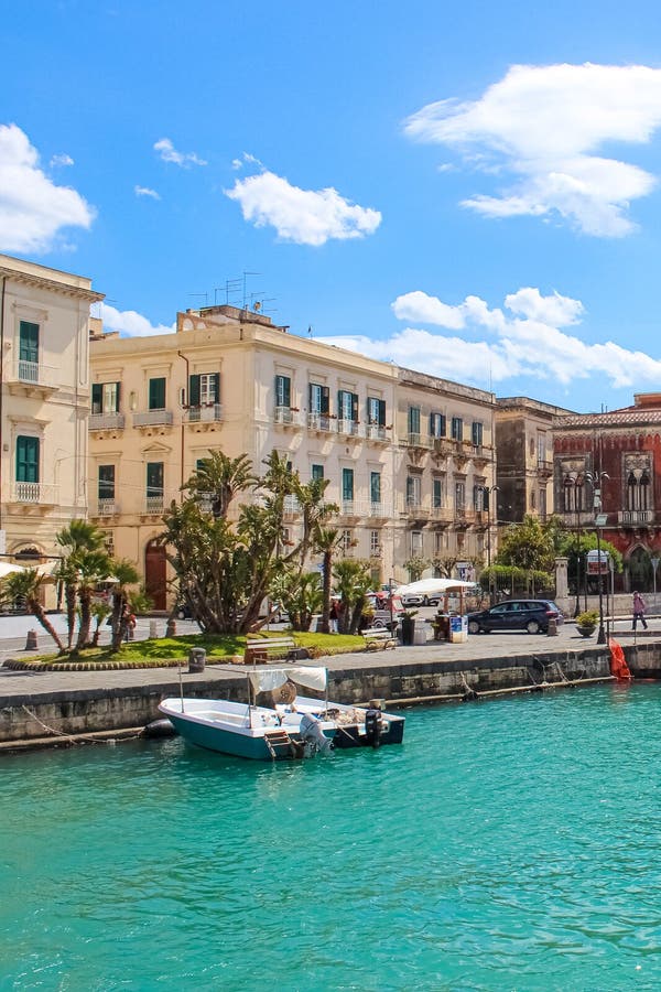Syracuse, Sicily, Italy - Apr 10th 2019: Amazing harbour between the historical city Syracuse and famous Ortigia Island royalty free stock image Syracuse, Sicily, Italy - Apr 10th 2019: Amazing harbour between the historical city Syracuse and famous Ortigia Island royalty free stock image
