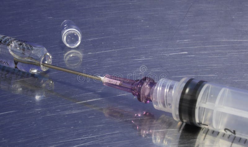 Syringe and ampule