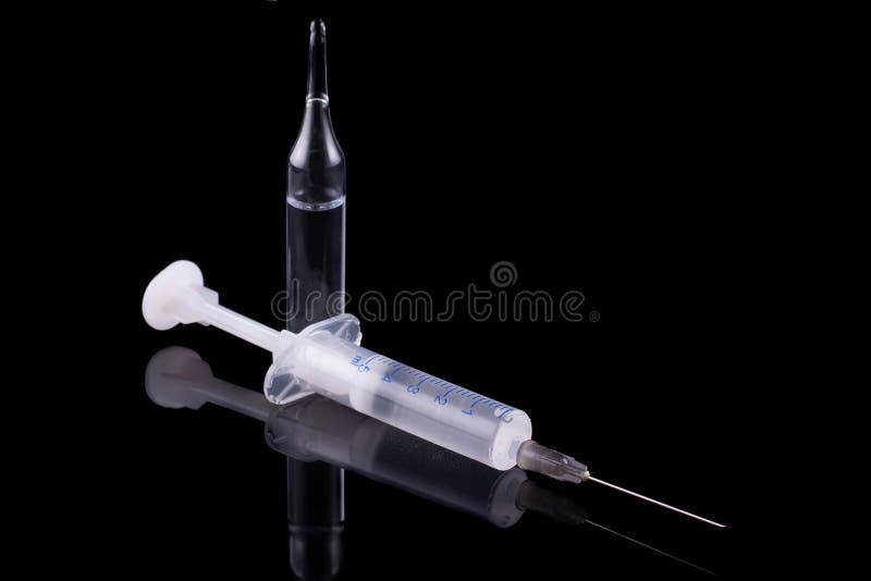 Syringe and glass vial stock photo. Image of medical 29066872