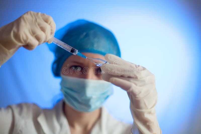 Nurse with a syringe stock photos Nurse with a syringe stock photos