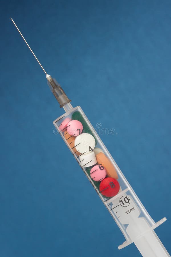 Syringe with medicine stock photos Syringe with medicine stock photos