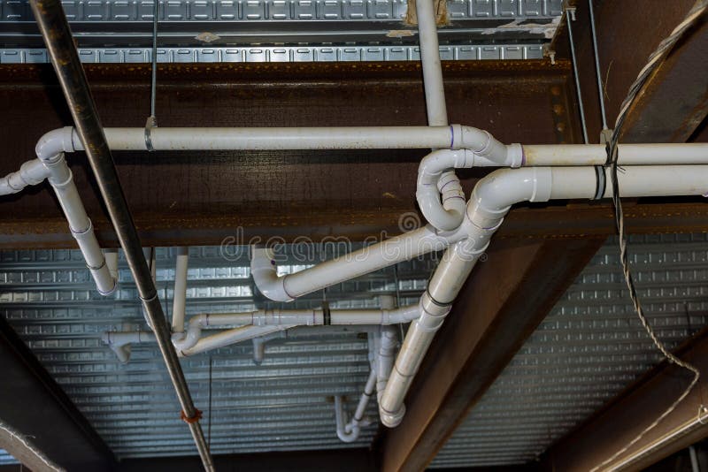 A System for Assembling Waste Pipes Under the Ceiling of an Apartment