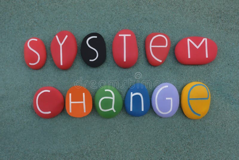 We must change the system, not the climate, unique slogan composed with multicolored stones over green sand. World climate change stock images, royalty-free photos and pictures