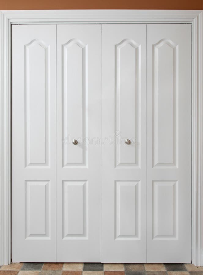 Closeup on white double closet door. Closeup on white double closet door