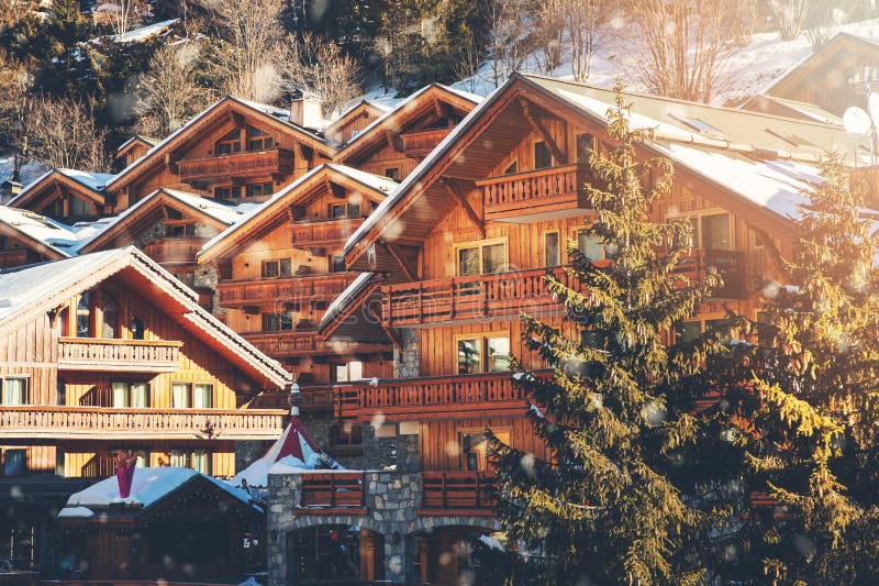 chalets at Meribel ski resort on sunny winter day in Alps, France. chalets at Meribel ski resort on sunny winter day in Alps, France