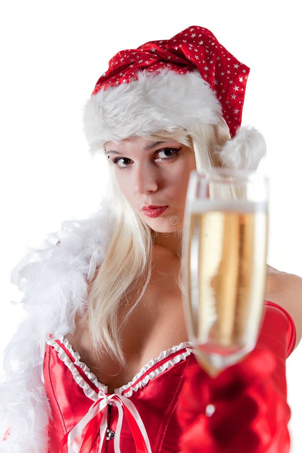 Mrs. Santa stretching champagne glass, focus on face, isolated on white background. Mrs. Santa stretching champagne glass, focus on face, isolated on white background