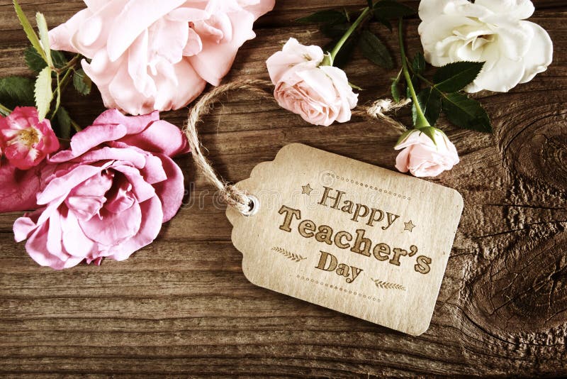 Szczęśliwa nauczyciela dnia wiadomości karta z małymi różami