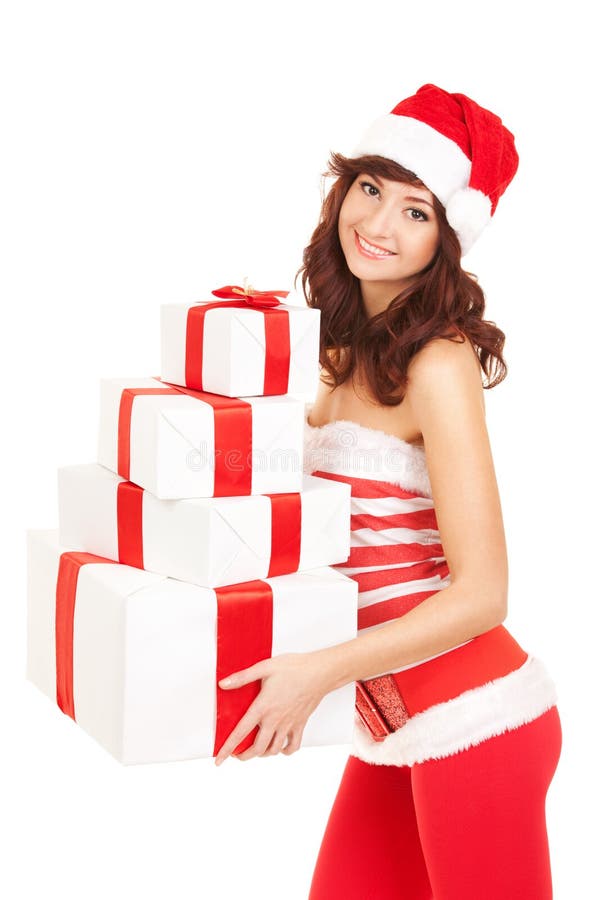 Szczęśliwa Santa kobieta z prezentów pudełkami fotografia stock Szczęśliwa Santa kobieta z prezentów pudełkami fotografia stock
