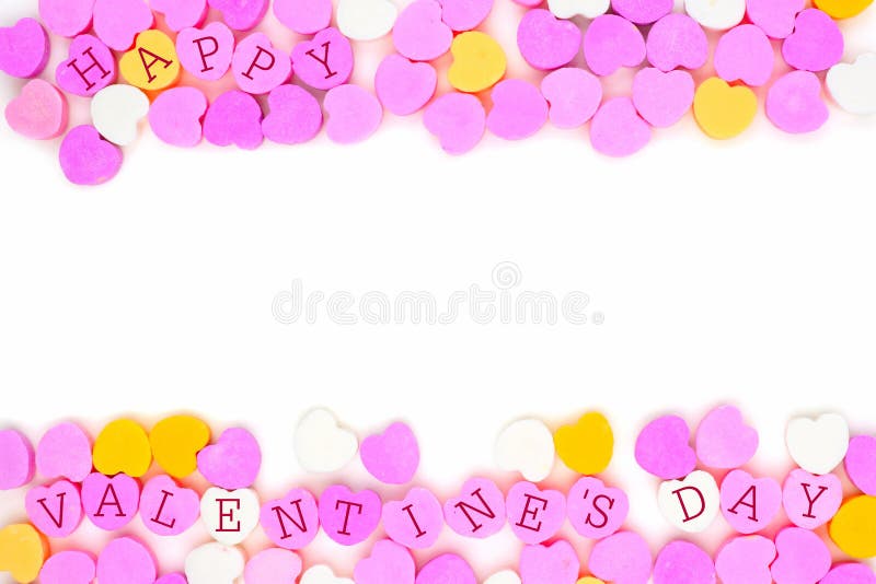 Pastel colored candy hearts with Happy Valentines Day text forming a double border over white. Pastel colored candy hearts with Happy Valentines Day text forming a double border over white
