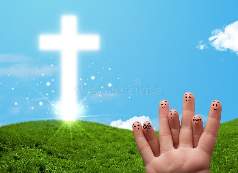 Happy finger smiley faces on hand with christian religion cross. Happy finger smiley faces on hand with christian religion cross