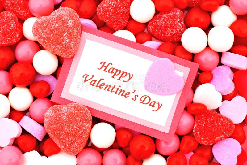 Happy Valentines Day card on candy background. Happy Valentines Day card on candy background