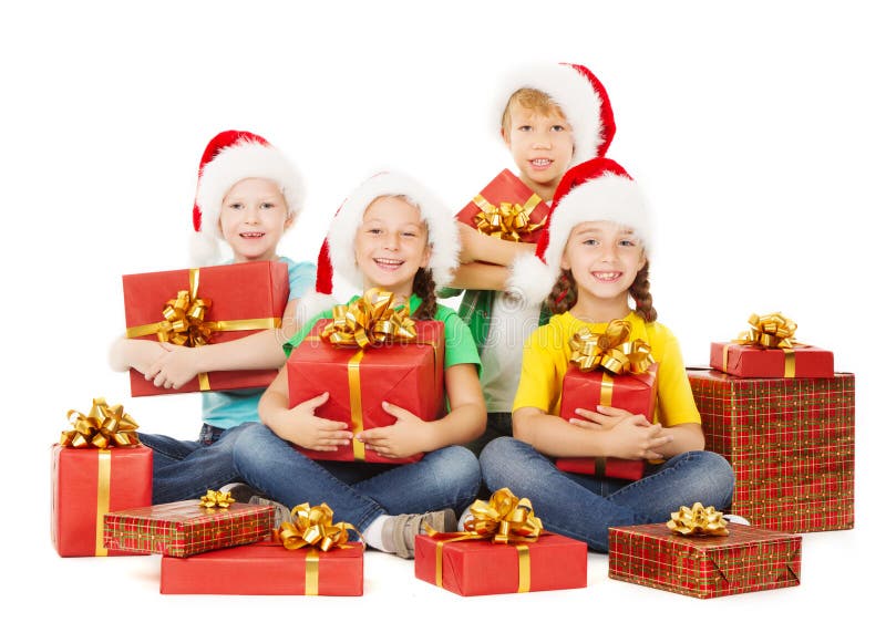 Szczęśliwych bożych narodzeń dzieciaki trzyma teraźniejszość Santa pomagiery z prezentami zdjęcie royalty free Szczęśliwych bożych narodzeń dzieciaki trzyma teraźniejszość Santa pomagiery z prezentami zdjęcie royalty free