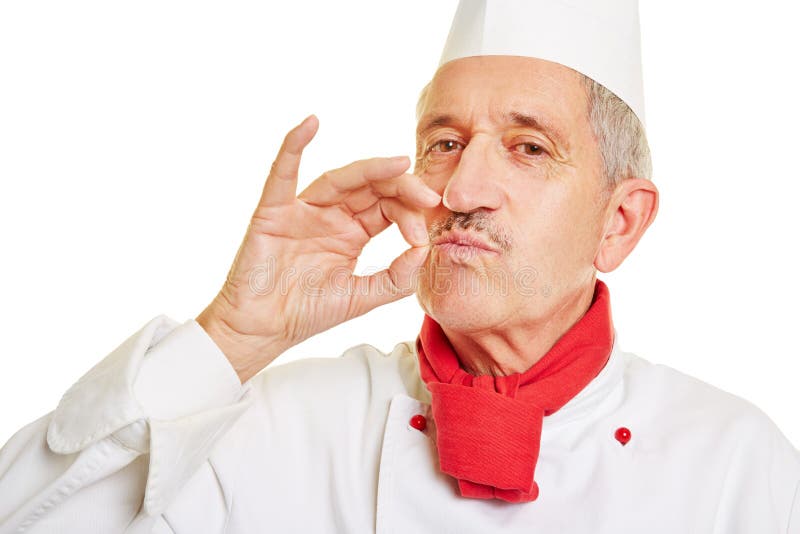 Szefa kuchni kucharz robi gesta smakowi na dobre