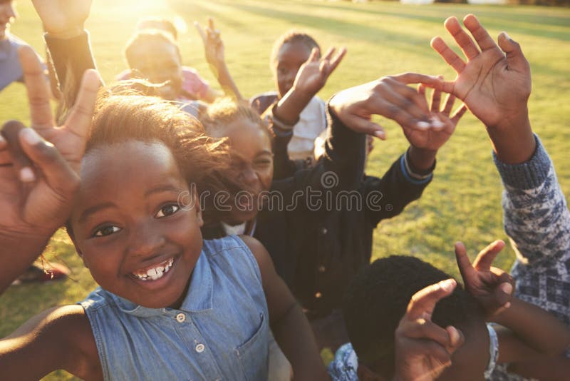 Elementary school kids outdoors, high angle, lens flare. Elementary school kids outdoors, high angle, lens flare