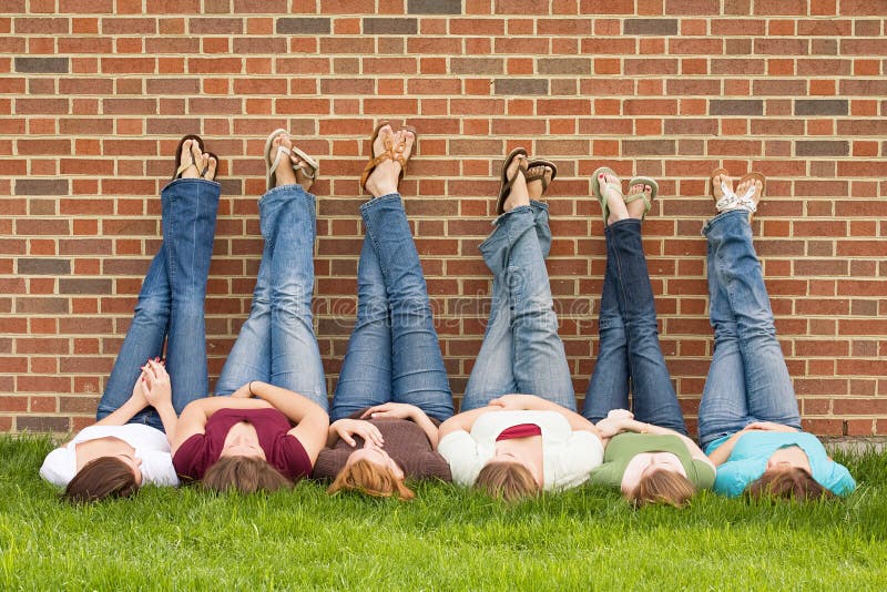 Group of College Girls With Legs on Wall. Group of College Girls With Legs on Wall