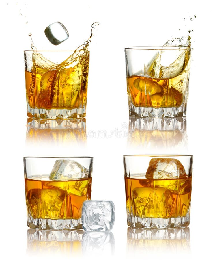 Set of scotch whiskey glasses with splash and ice isolated on a white. Set of scotch whiskey glasses with splash and ice isolated on a white