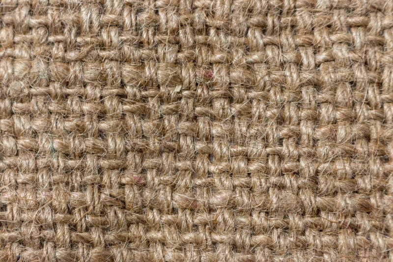 Szorstki dziewiarski tło Prostacki textured płótno zdjęcie stock Szorstki dziewiarski tło Prostacki textured płótno zdjęcie stock