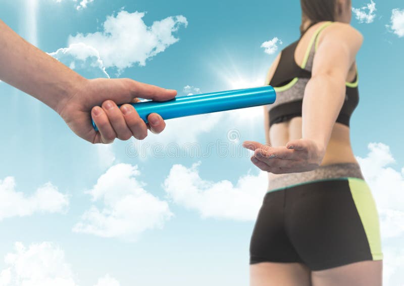 Digital composite of Relay runner and hand with blue baton against sky with flares. Digital composite of Relay runner and hand with blue baton against sky with flares