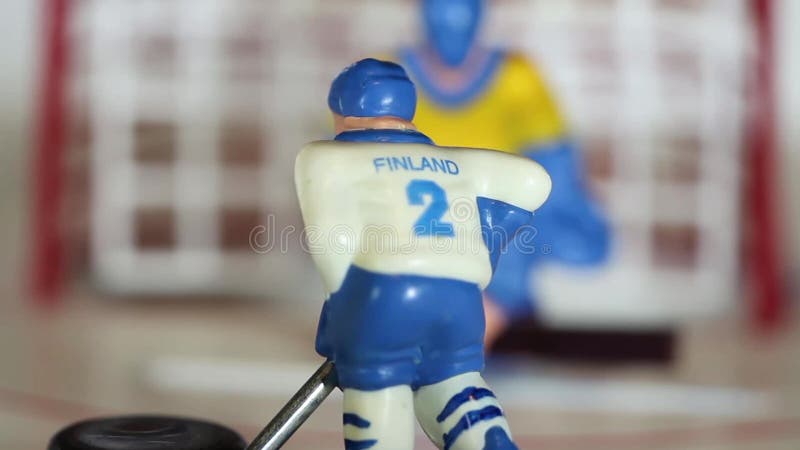 Szturmowy lodowy hokej Finlandia zdobywa punkty krążek hokojowego
