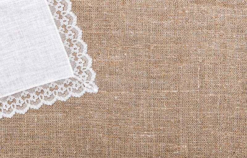 Burlap background and linen cloth with lace. Burlap background and linen cloth with lace