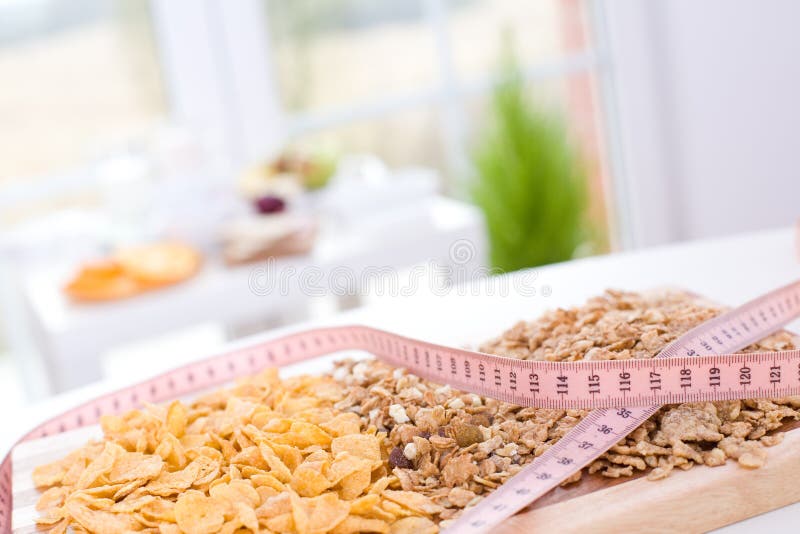 Diet / Cereal on the board and measure tape. Diet / Cereal on the board and measure tape