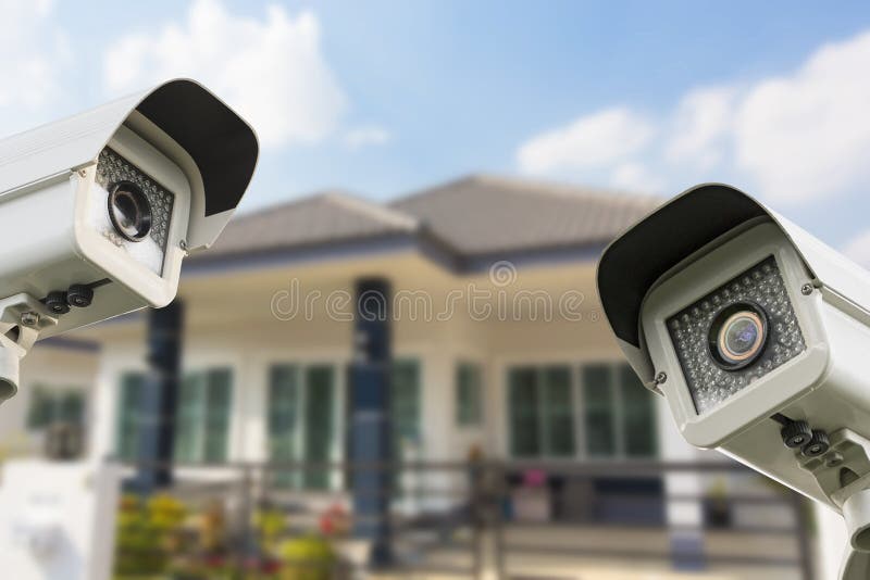 Säkerhet för CCTV-hemkamera som fungerar på huset royaltyfri bild Säkerhet för CCTV-hemkamera som fungerar på huset royaltyfri bild