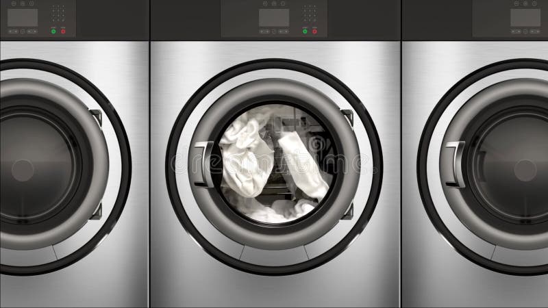 Sèche-linge commerciaux du mouvement lent 4k pleins de serviettes blanches lumineuses illustration libre de droits