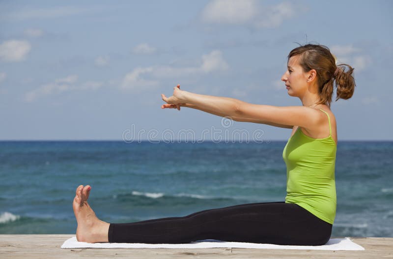 Fitness and yoga workout on the beach. Fitness and yoga workout on the beach