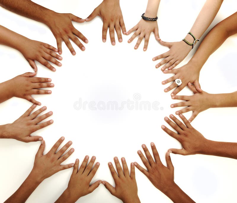 Conceptual symbol of multiracial children hands making a circle on white background with a copy space in the middle. Conceptual symbol of multiracial children hands making a circle on white background with a copy space in the middle