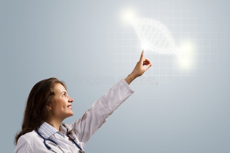 Símbolo de incandescência do ADN do dedo do doutor da jovem mulher fotografia de stock Símbolo de incandescência do ADN do dedo do doutor da jovem mulher fotografia de stock
