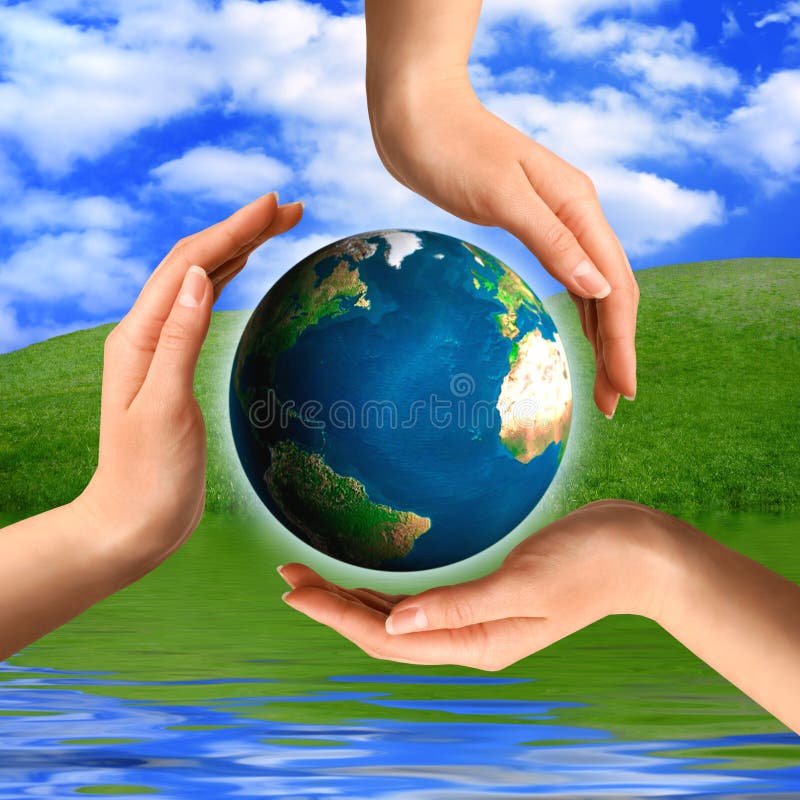 Conceptual recycling symbol made from hands and a small Earth globe Environment and ecology concept. Conceptual recycling symbol made from hands and a small Earth globe Environment and ecology concept