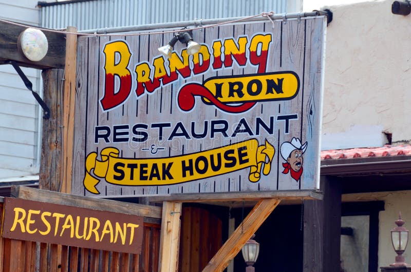 WILLIAMS ARIZONA APRIL 25 2014: Typical South west restaurant steak house sign on famous,  Historic Route 66. WILLIAMS ARIZONA APRIL 25 2014: Typical South west restaurant steak house sign on famous,  Historic Route 66