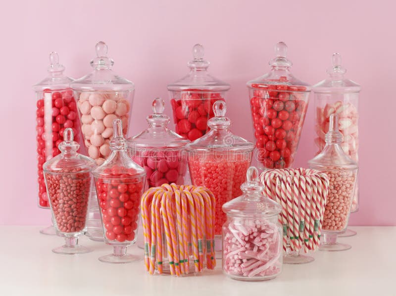 Candies In Bowls On Pink Background. Candies In Bowls On Pink Background