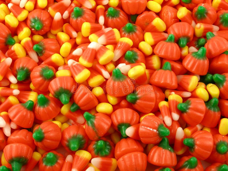 A surface covered with Halloween candy. A surface covered with Halloween candy