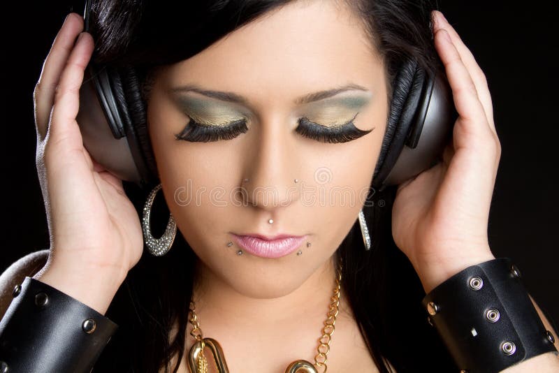 Music listening teen wearing headphones. Music listening teen wearing headphones