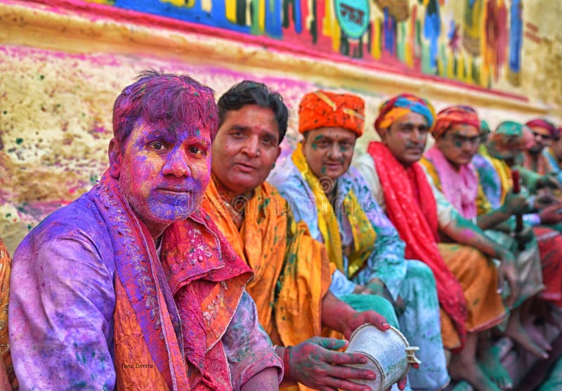 Women holding (Lathi) ritually Hindu men during the Lathmar Holi Festival. The Lathmar Holi festival is based on a Hindu legend, according to which Lord Krishna travelled from his home village of Nandgaon to Barsana to tease his lover Radha. Women holding (Lathi) ritually Hindu men during the Lathmar Holi Festival. The Lathmar Holi festival is based on a Hindu legend, according to which Lord Krishna travelled from his home village of Nandgaon to Barsana to tease his lover Radha.