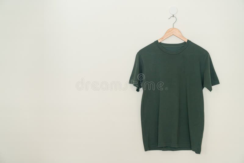 T-shirt Hanging with Wood Hanger Stock Photo - Image of hanger, navy ...