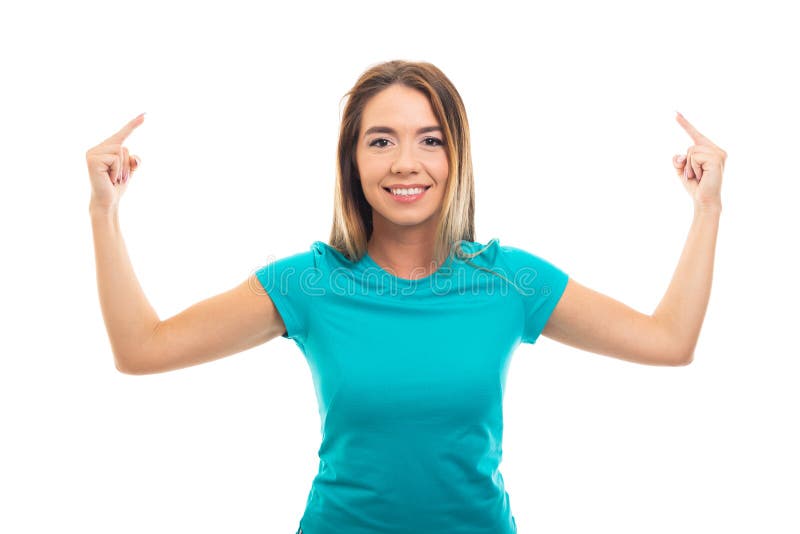 T-shirt vestindo da menina bonita nova que mostra ambos os ges do dedo médio imagem de stock T-shirt vestindo da menina bonita nova que mostra ambos os ges do dedo médio imagem de stock