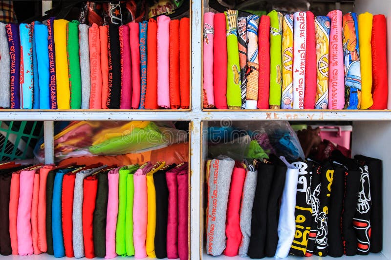 T-shirts on the shelf stock image. Image of storage, shop - 40823155