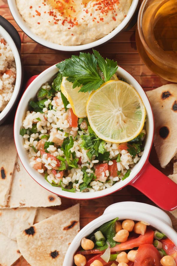 Tabbouleh, middle eastern salad with bulgur wheat, tomato and parsley. Tabbouleh, middle eastern salad with bulgur wheat, tomato and parsley