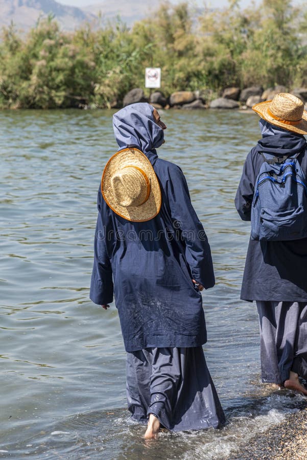 Nuns visiting the shore of Sea of Galilee in Tabgha church. Tabgha, Israel - May 18 2019 : Nuns visiting the shore of Sea of Galilee in Tabgha church stock image Nuns visiting the shore of Sea of Galilee in Tabgha church. Tabgha, Israel - May 18 2019 : Nuns visiting the shore of Sea of Galilee in Tabgha church stock image