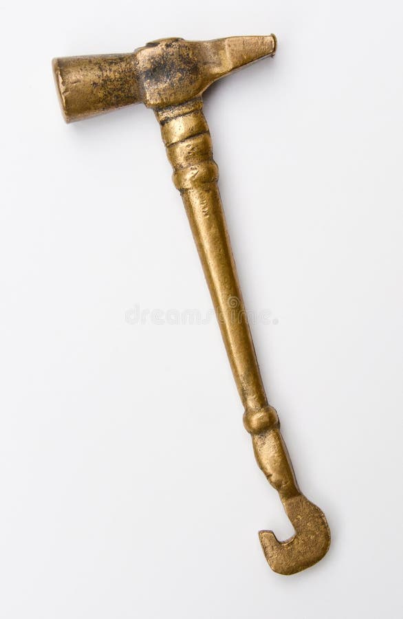 This antique brass hammer is used for tuning tabla drums, the traditional drums of India. This antique brass hammer is used for tuning tabla drums, the traditional drums of India.